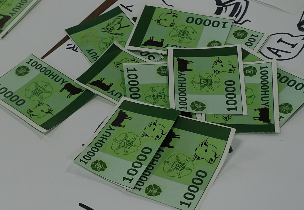 ワークショップで使用した疑似通貨の写真