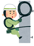 電柱に登る男性